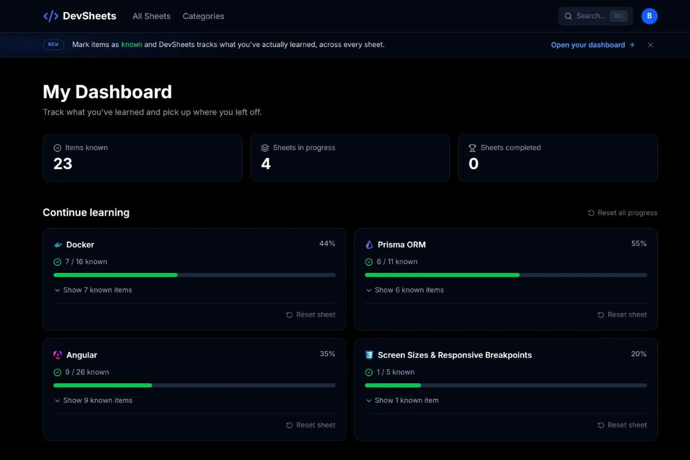 Signed-in DevSheets dashboard showing 23 known items across four sheets with progress percentages